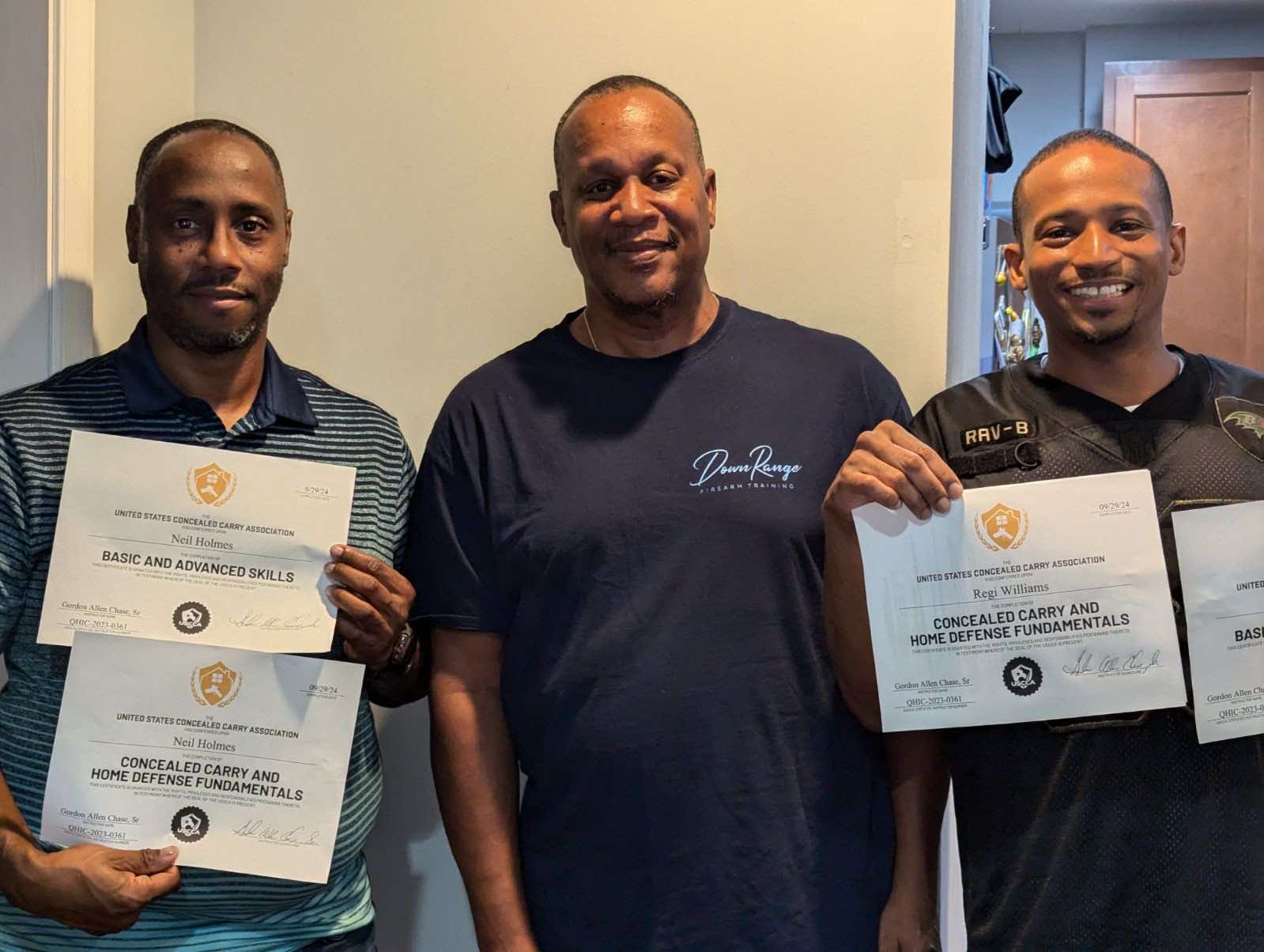 Gordon Chase with certified students after completing firearm training
